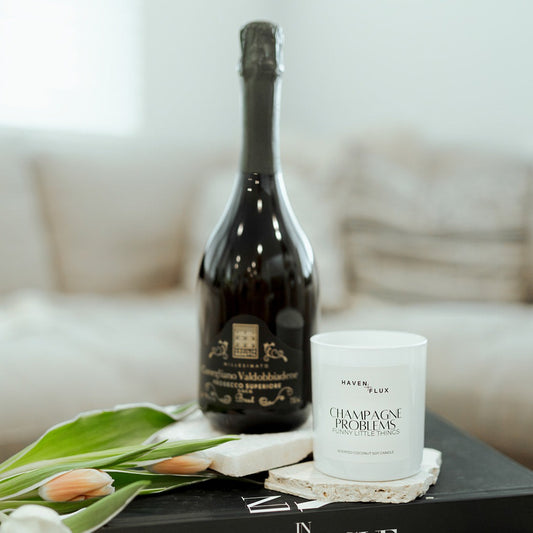 Elevate your senses with the alluring scent of Champagne Problems in a coconut soy blend.